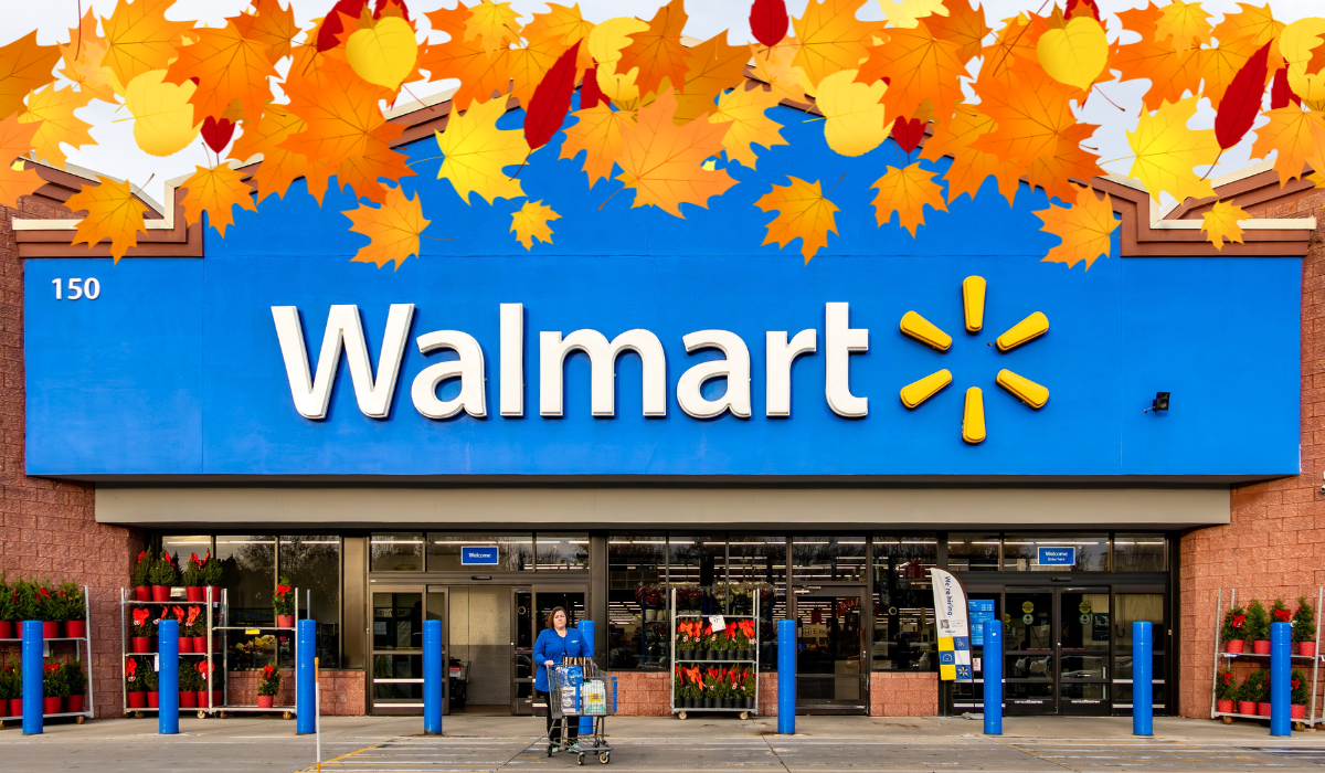 a walmart storefront with a fall leaves banner