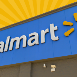 walmart storefront sign with a yellow sunburst background