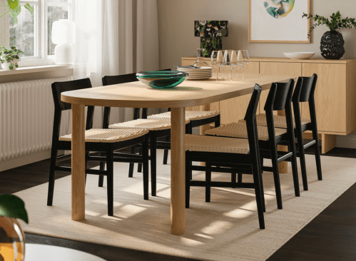 oval dining table with black chairs