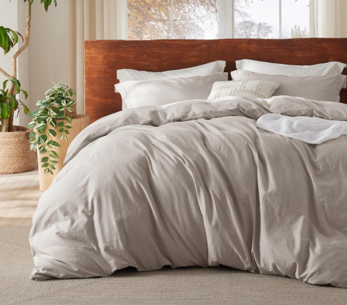 taupe colored duvet set on a bed