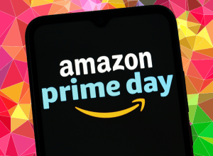 amazon prime day on a black phone screen with a colorful geometric background