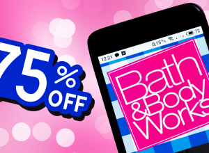 Bath & Body Works logo on a phone with a 75% off graphic on a pink background