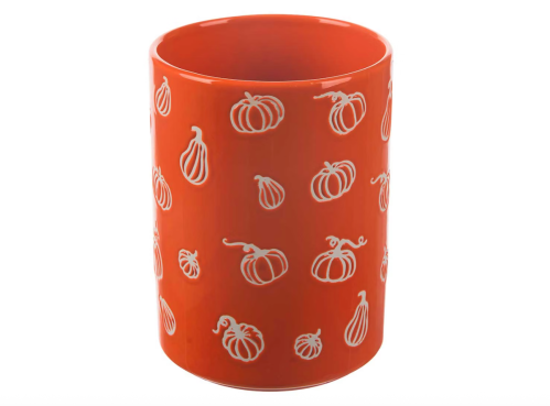 orange utensil holder with pumpkin design