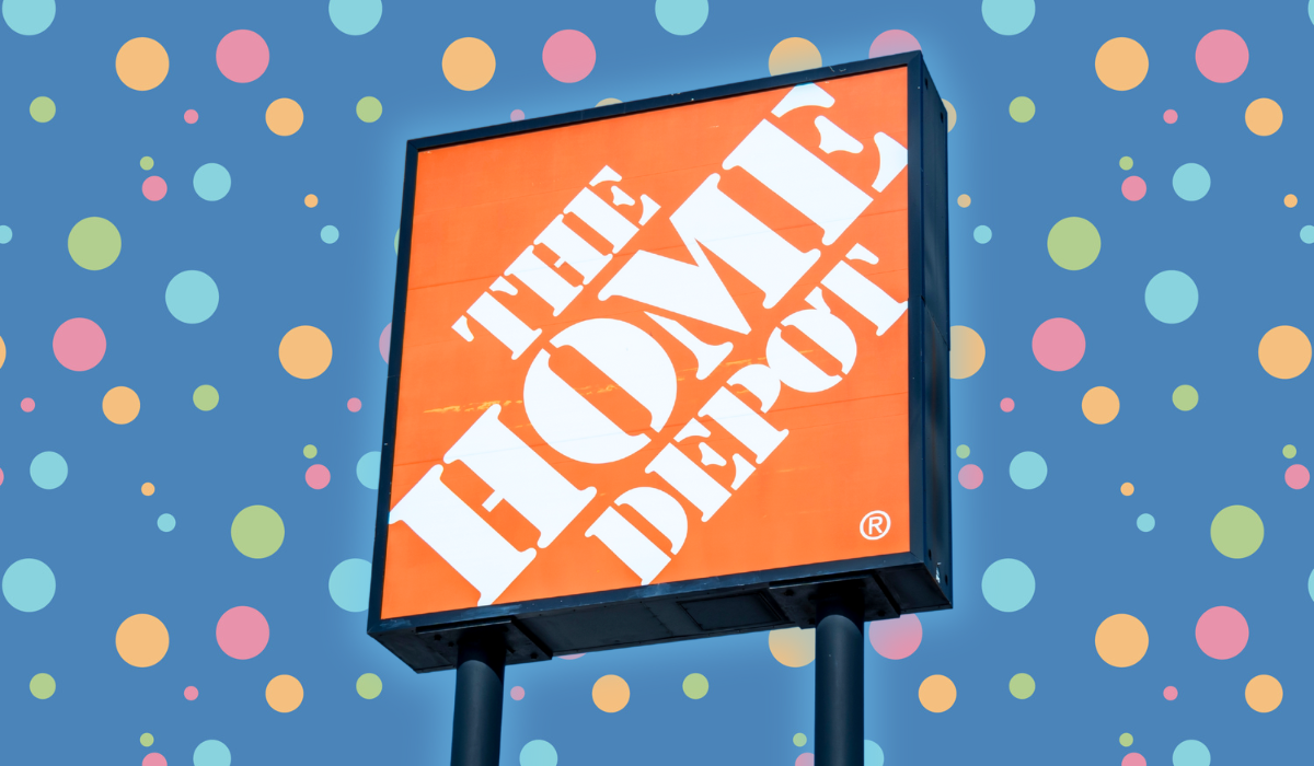 home depot sign against a blue polka dot background