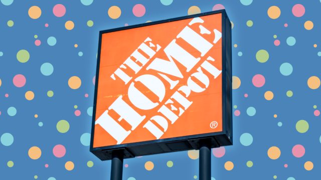 home depot sign against a blue polka dot background