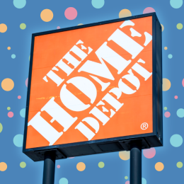 home depot sign against a blue polka dot background