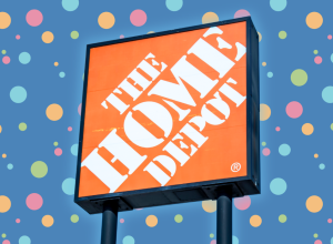 home depot sign against a blue polka dot background