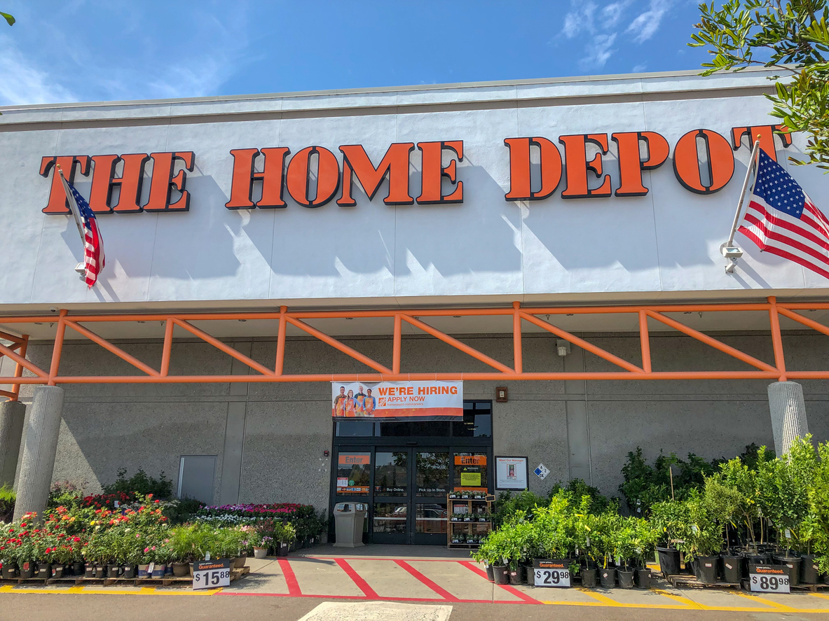 A Home Depot storefront with plants for sale