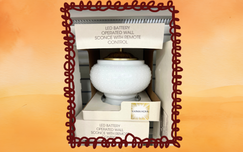 white milk glass sconce at HomeGoods