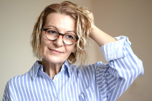 mature woman scrunching her hair