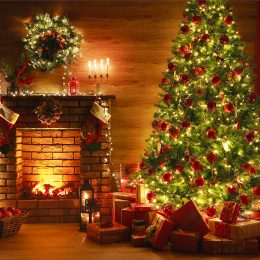 interior christmas. magic glowing tree, fireplace, gifts in dark at night