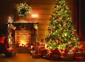interior christmas. magic glowing tree, fireplace, gifts in dark at night