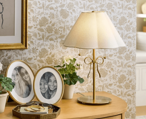 brass lamp on a table