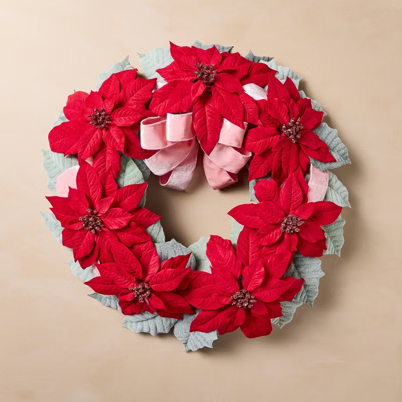 An artificial poinsettia wreath