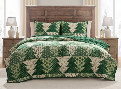 Christmas quilt on a bed