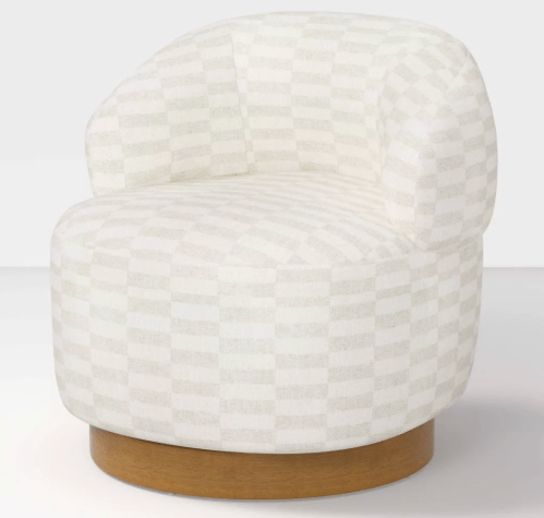 cream colored swivel chair
