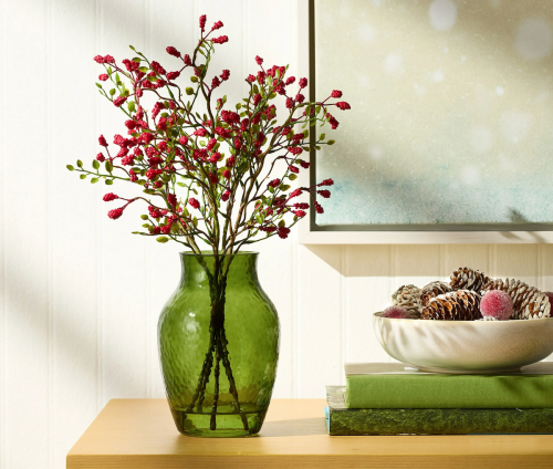green vase with faux winterberry