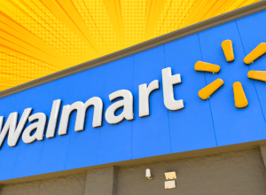 walmart sign on a store with a yellow-orange background