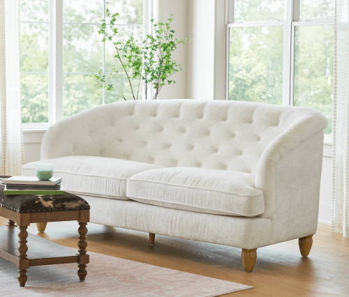 white tufted sofa