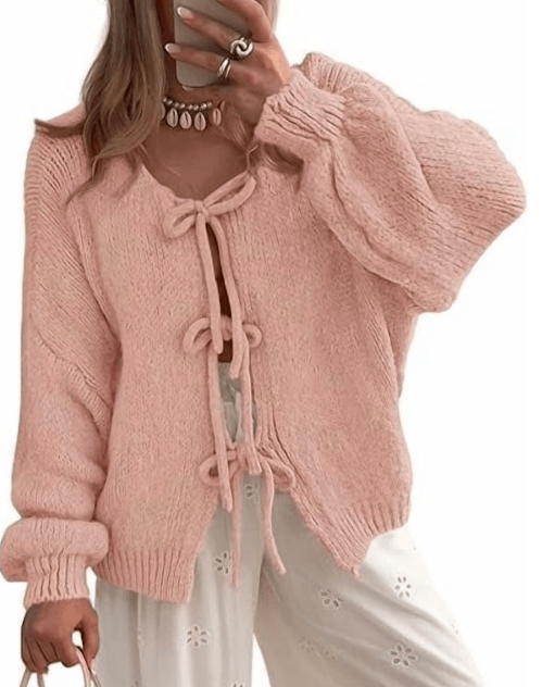 woman wearing a pink sweater