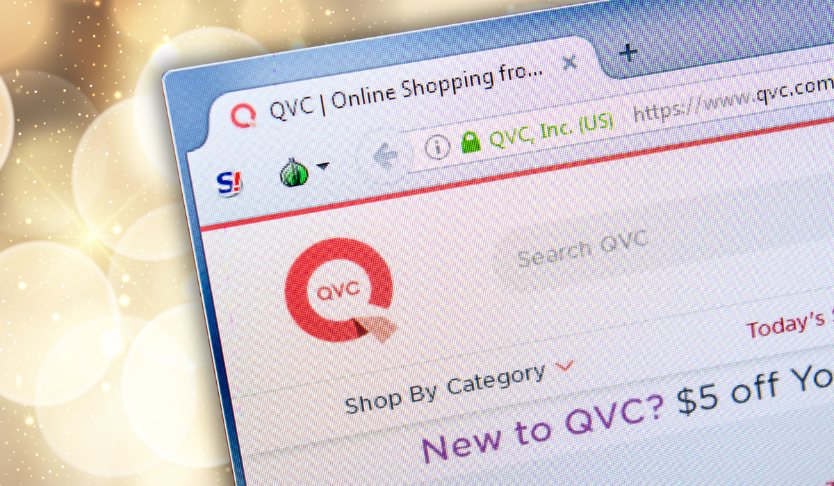 QVC website with a gold background