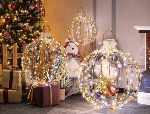 set of three lit ornaments