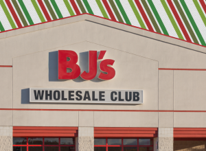 BJ's Wholesale Club store with a striped Christmas background