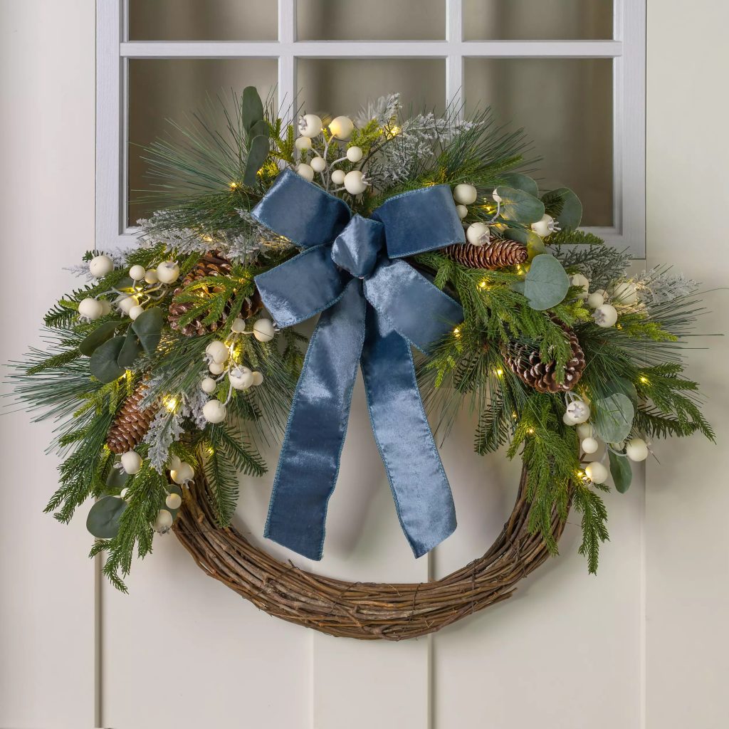 A prelit blue velvet bow wreath