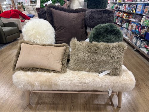 faux fur pillows and bench