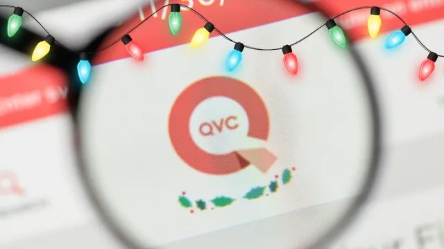 QVC on screen with Christmas lights