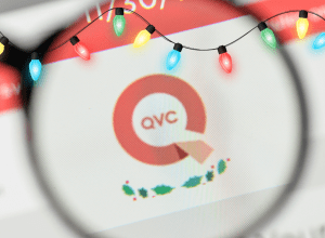 QVC on screen with Christmas lights