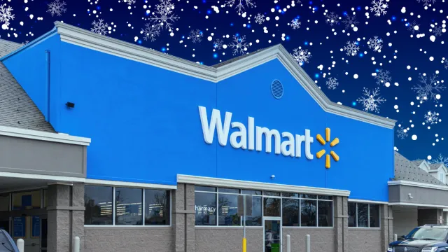 Walmart store with a snowy night sky background