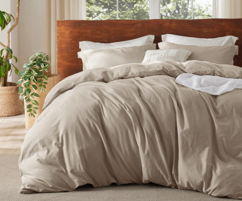 beige duvet set on bed