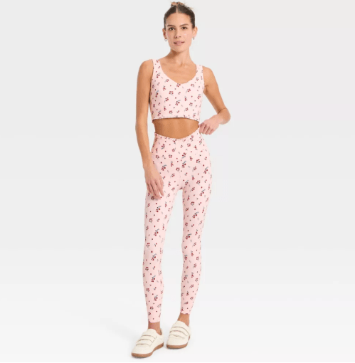 woman wearing pink floral workout set