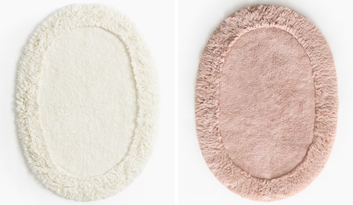 cream and pink bath rugs