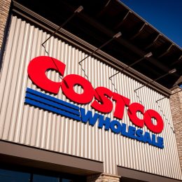 Bend, Oregon US - June 6, 2025: Costco logo sign on one of its stores modern facade. Costco Wholesale exterior trademark logo. Copy space