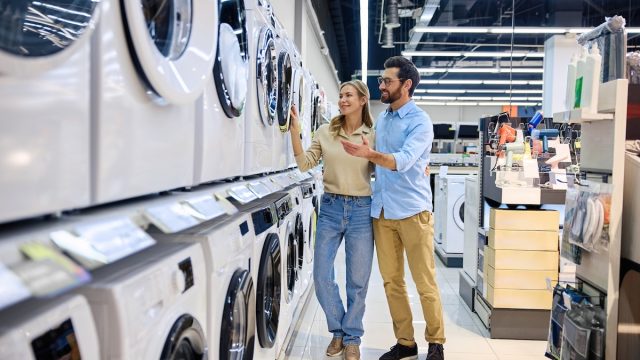 couple shopping at an appliance store