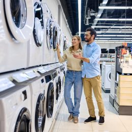 couple shopping at an appliance store