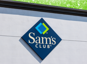 Sam's Club sign on a store with a bright green background