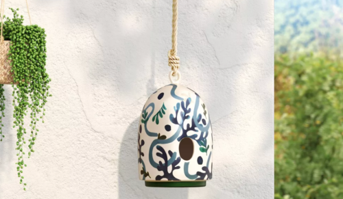 blue and white painted ceramic birdhouse