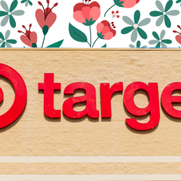 Sign on a Target store with a red floral background
