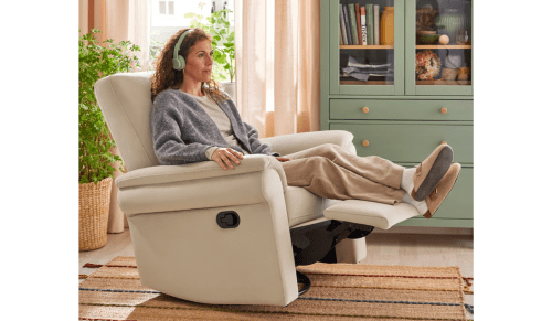 woman sitting in reclining chair