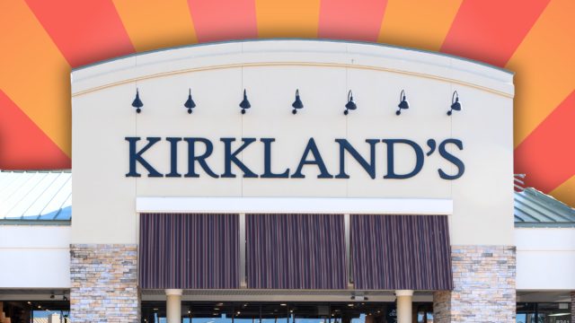 Kirkland's Home store with an orange and peach striped background