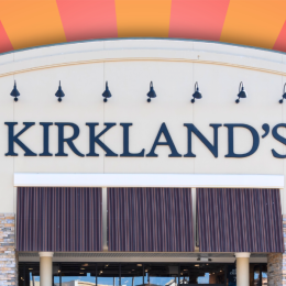 Kirkland's Home store with an orange and peach striped background