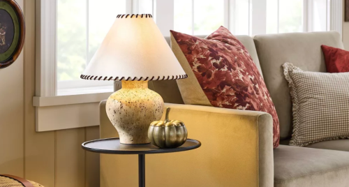 ceramic table lamp with a whipstitch shade