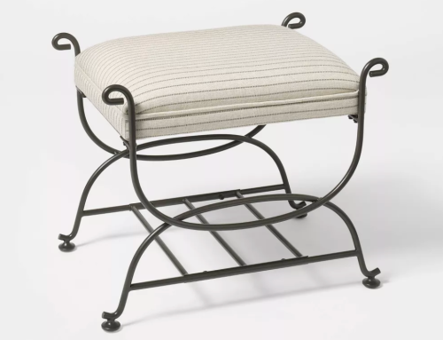 striped upholstered metal ottoman