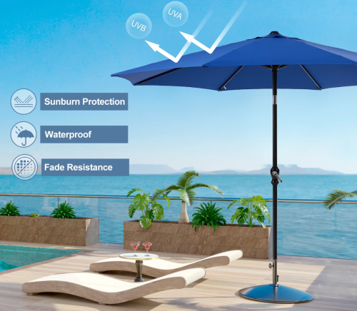 blue outdoor umbrella next to a pool