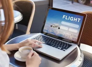 flight search on internet website, travel planning concept, airplane tickets online