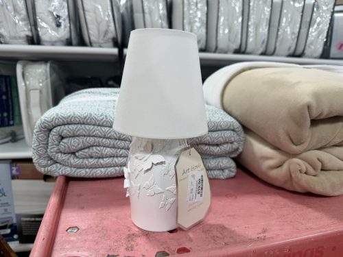 homegoods-bedroom-under-20-little-butterfly-lamp