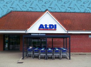 11 Best New Aldi Pantry and Kitchen Organization Finds Under $10. Templin, Brandenburg Uckermark District - Germany - May 18, 2025: Shopping cart in front of the Aldi discount store